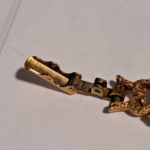 Avon gold tone bracelet with intricate designs - Picture 3 of 8